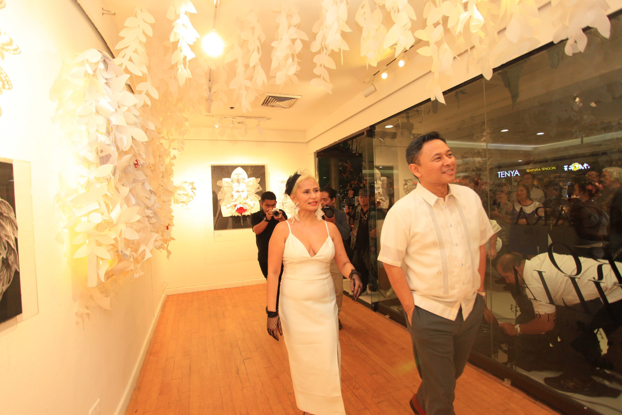 With brother, Senator Sonny Angara, whose comic books she devoured for their cartoon figures. | Photo by Mark Pimentel