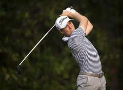 JT not happy with 62, Scottish lead