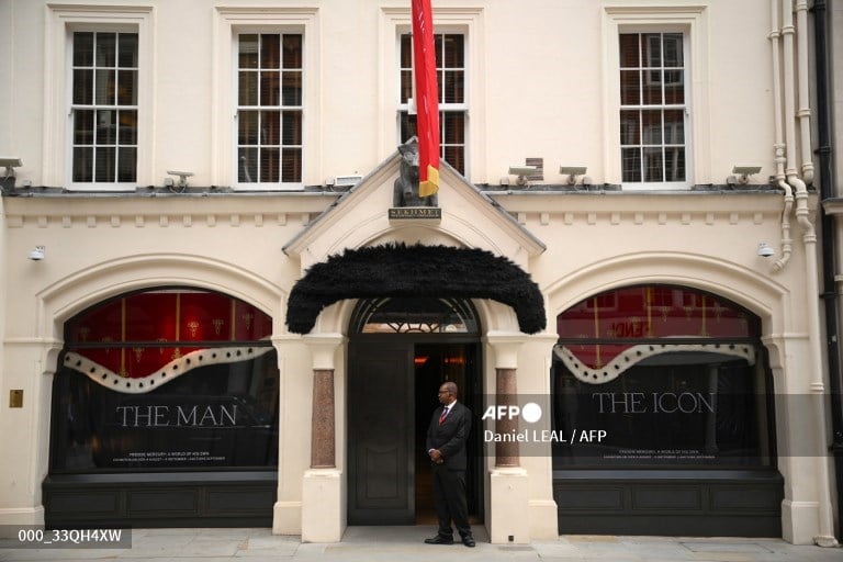 A faux moustache is pictured above the entrance to  Sotheby's auctioneers in Londonb ahead of a press preview for their "Freddie Mercury: A World of His Own" auctions. (Photo by Daniel LEAL / AFP)