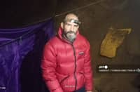 This video grab taken from footage released by The Turkish Direction of Communication on September 8, 2023, shows US caver Mark Dickey as he speaks to the camera while standing at a camp in the Morca Cave of the Taurus Mountains in southern Turkey. A US explorer trapped deep in a Turkish cave with internal bleeding said in a video released to AFP on Friday that he needed "a lot of help" getting out. Mark Dickey, 40, reported falling sick on September 2, while exploring the Morca Cave in southern Turkey's Taurus Mountains with an international team. Dickey fell ill at a depth of 1,120 metres (3,675 feet) and has been resting at a base camp located 1,040 metres underground. Photo by HANDOUT / TURKISH DIRECTION OF COMMUNICATION / AFP