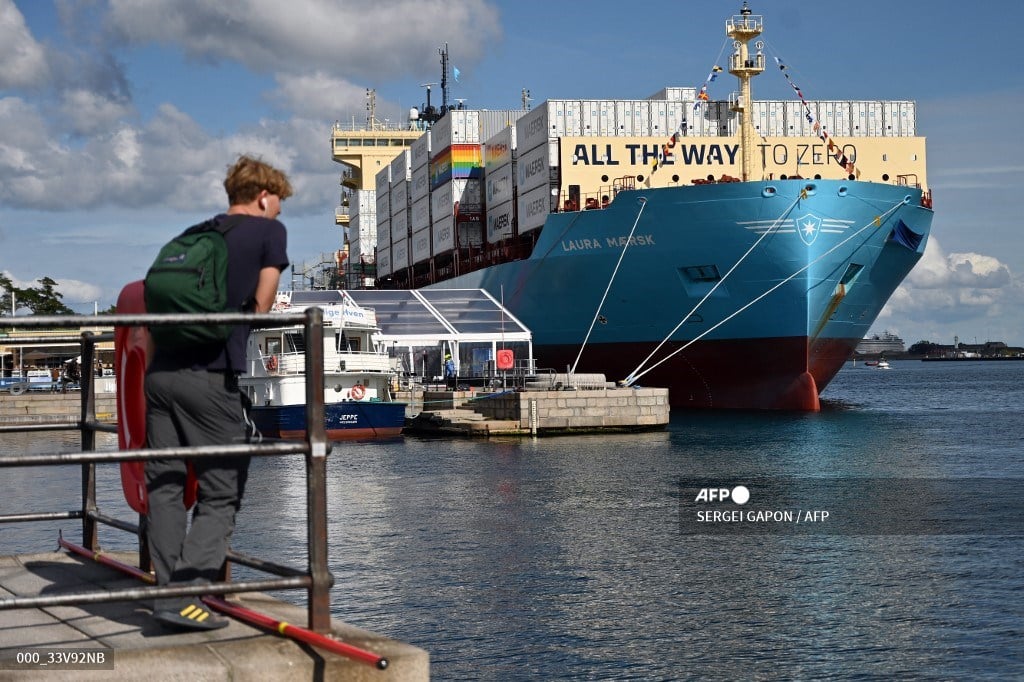 A view taken on September 14, 2023 shows the worlds first methanol-enabled container vessel called "Laura Maersk" of A.P. Moller-Maerska after its namegiving ceremony in Copenhagen. Built in South Korea by Hyundai Heavy Industries (HHI) and fitted with a dual-fuel engine, "Laura Maersk" is a relatively small model that will be able to transport 2,136 20-foot (TEU) containers. It will begin operating in the Baltic Sea in October 2023, Maersk said. (Photo by SERGEI GAPON / AFP)