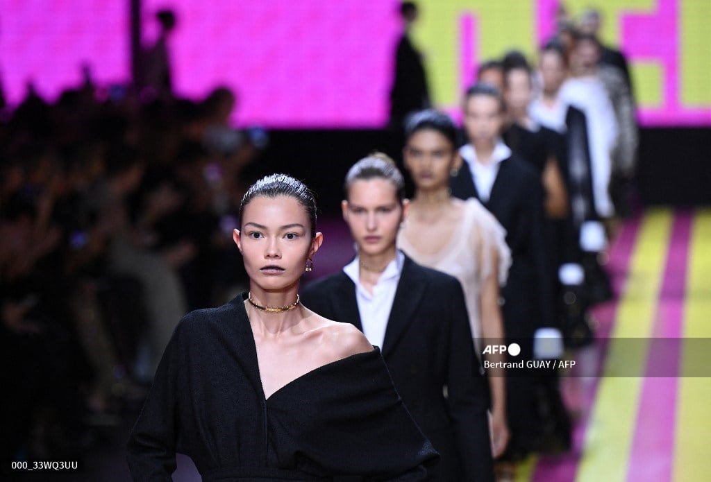 Models present creations for Christian Dior during a show as part of the Paris Fashion Week Womenswear Spring/Summer 2024 in Paris on September 26, 2023. (Photo by Bertrand GUAY / AFP)