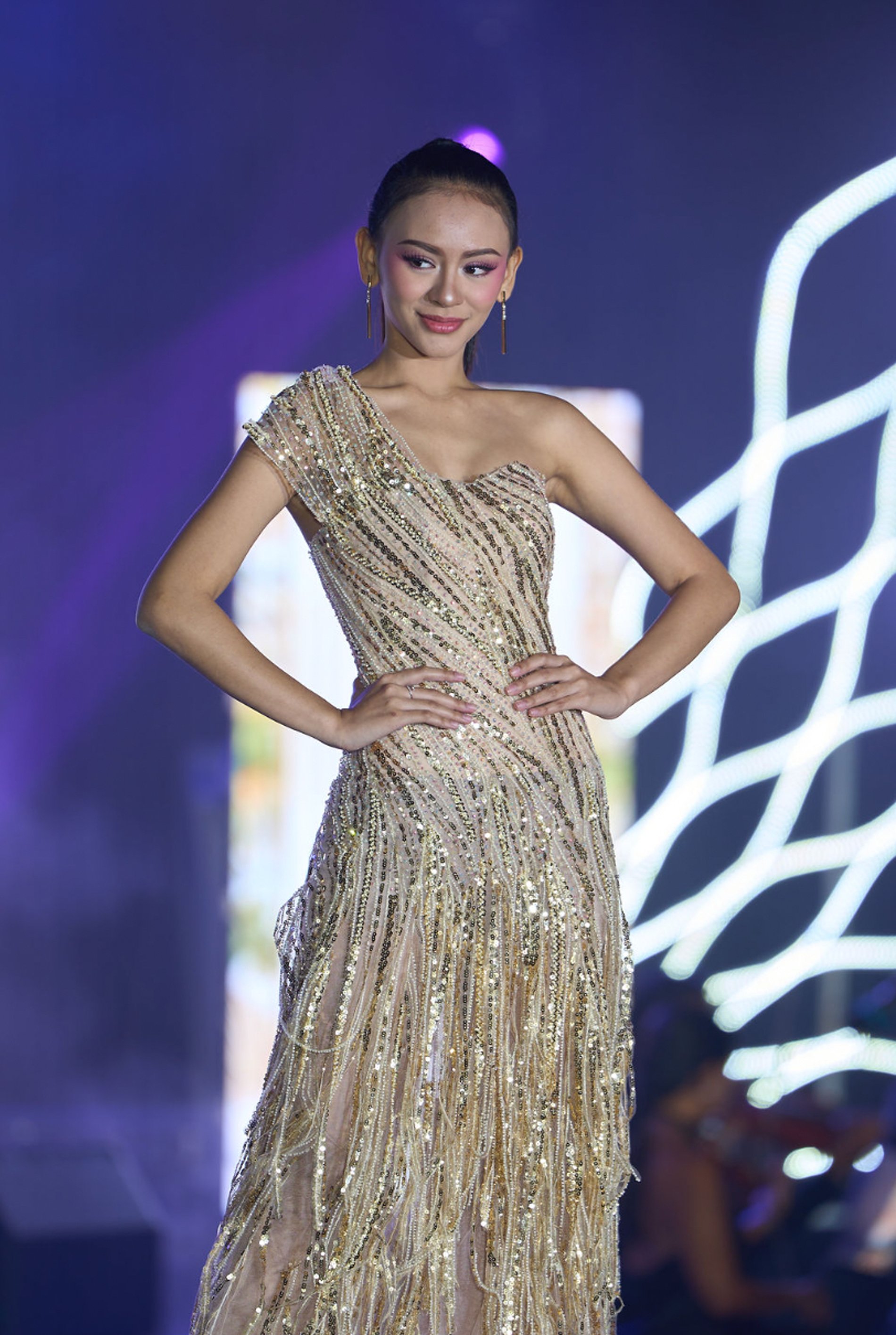 Evening gown by Paco Serafica.