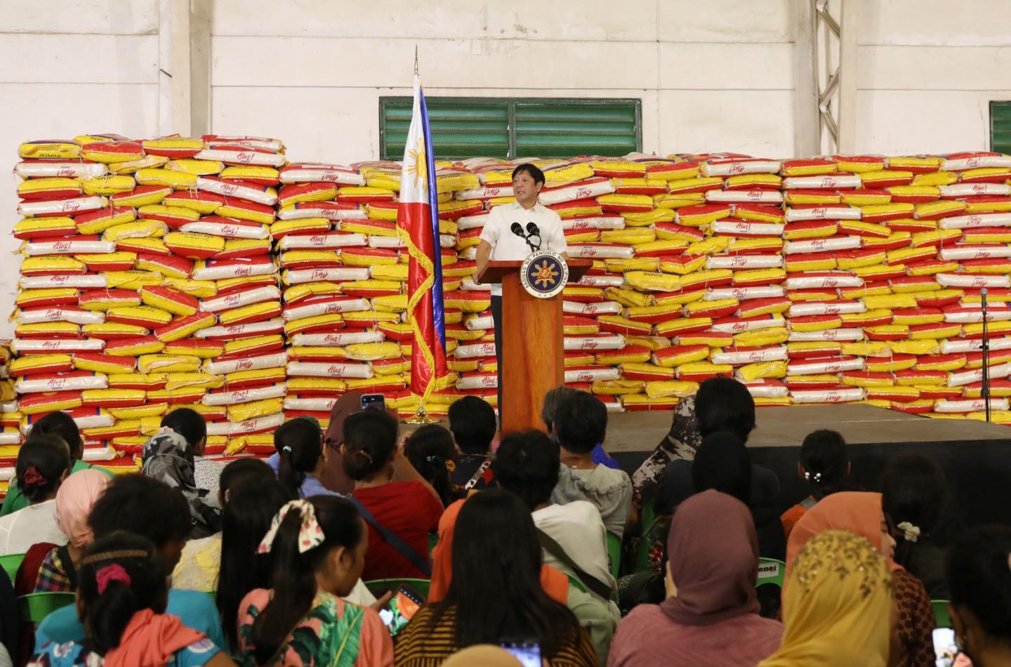 PBBM gives away confiscated smuggled rice to poor families