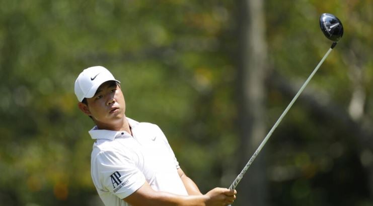 Olympic-chasing Kim grabs lead