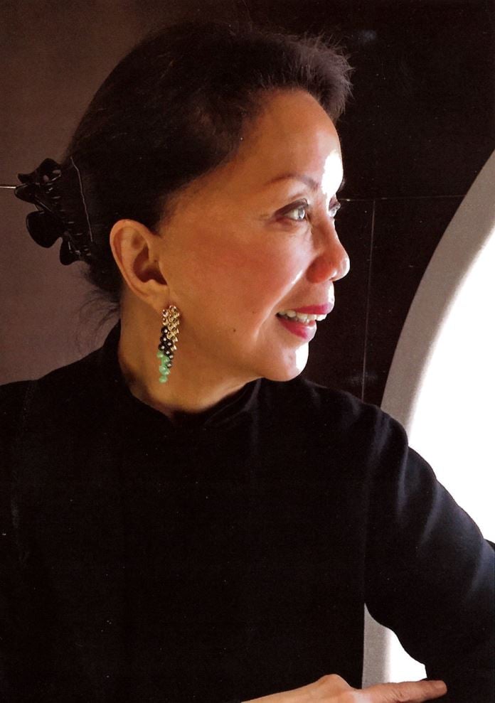 Wearing the Van Cleef earrings purchased before their public launch.