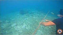Philippine Coast Guard says ‘successfully removes’ barrier at disputed reef