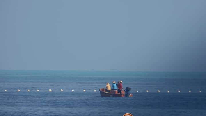 China's 300-m floating barrier on Scarborough Shoal prevents Philippine fishing boats from entering the shoal, denying them their livelihood as well as depriving the country of a valuable food source. (Photo courtesy of the Philippine Coast Guard)