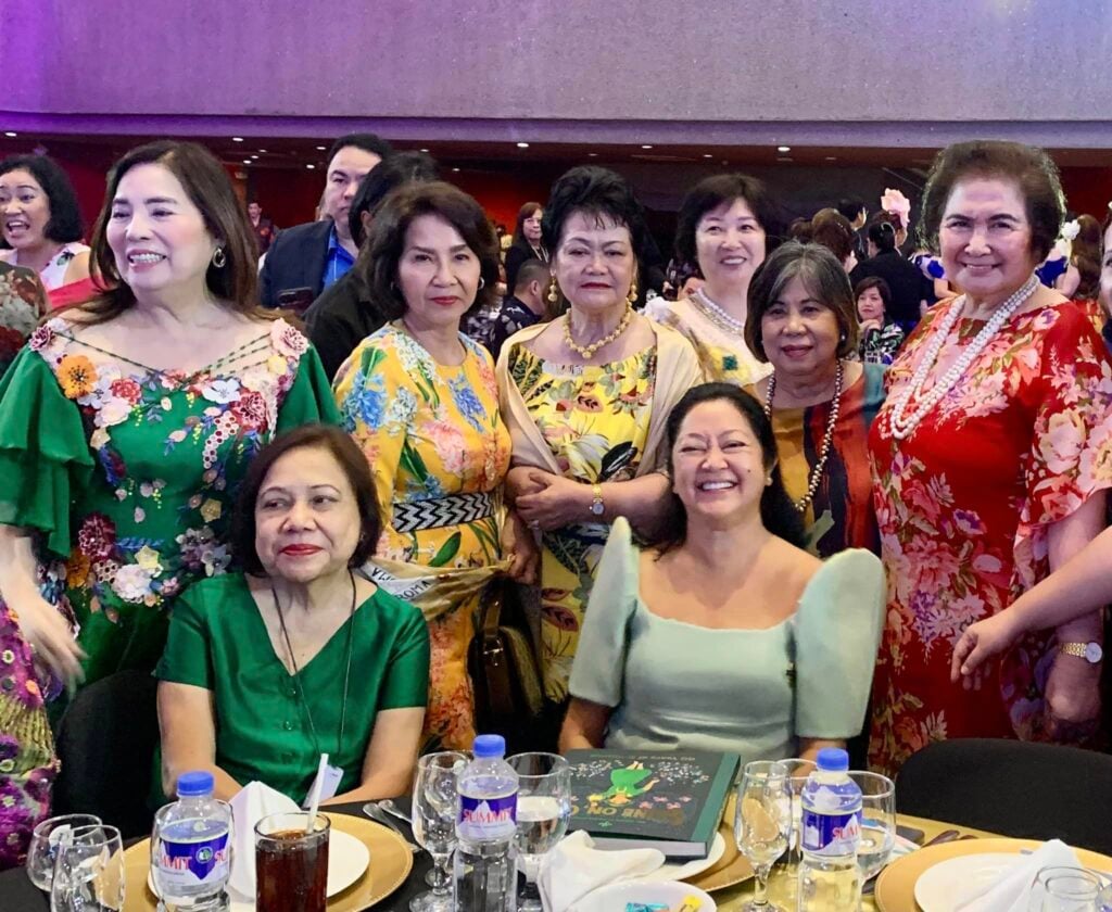 (Standing, from left) Baby Ortiz, Ellen Choi, Minda Pama, Frieda Hizon and Yves Mendoza. (Seated) Senator Cynthia Villar and First Lady Liza Araneta-Marcos.
