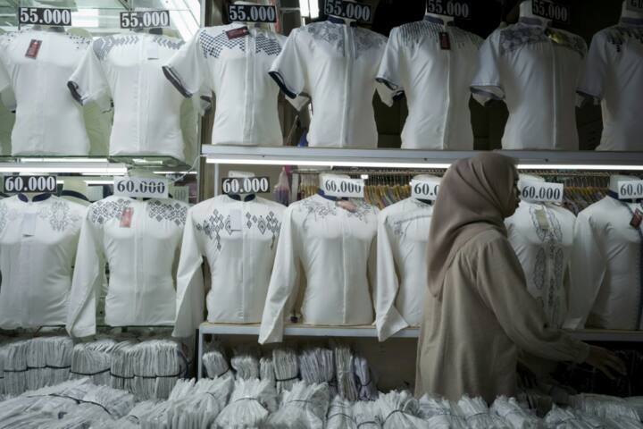 government ministers in Southeast Asia's biggest economy have threatened to ban the app outright because of its impact on local sellers, including those at Tanah Abang who rely on offline buyers. (Photo: Yasuyoshi CHIBA / AFP)
