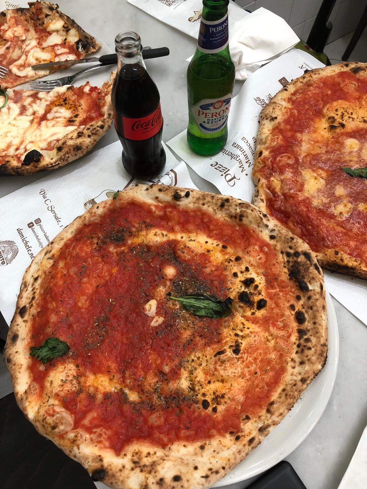 Napoli staples. Pizza Napoletana, a cold brew and your favorite cola.