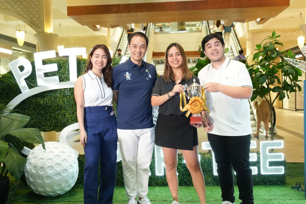 Photographs courtesy of Original Penguin<br />ANTHEM Group CEO Cheryl Lao and chairman Ericson Lee awarded the grand prize to siblings Sam Godinez-Valenciano and Mikel Godinez for winning the friendly mini golf competition.
