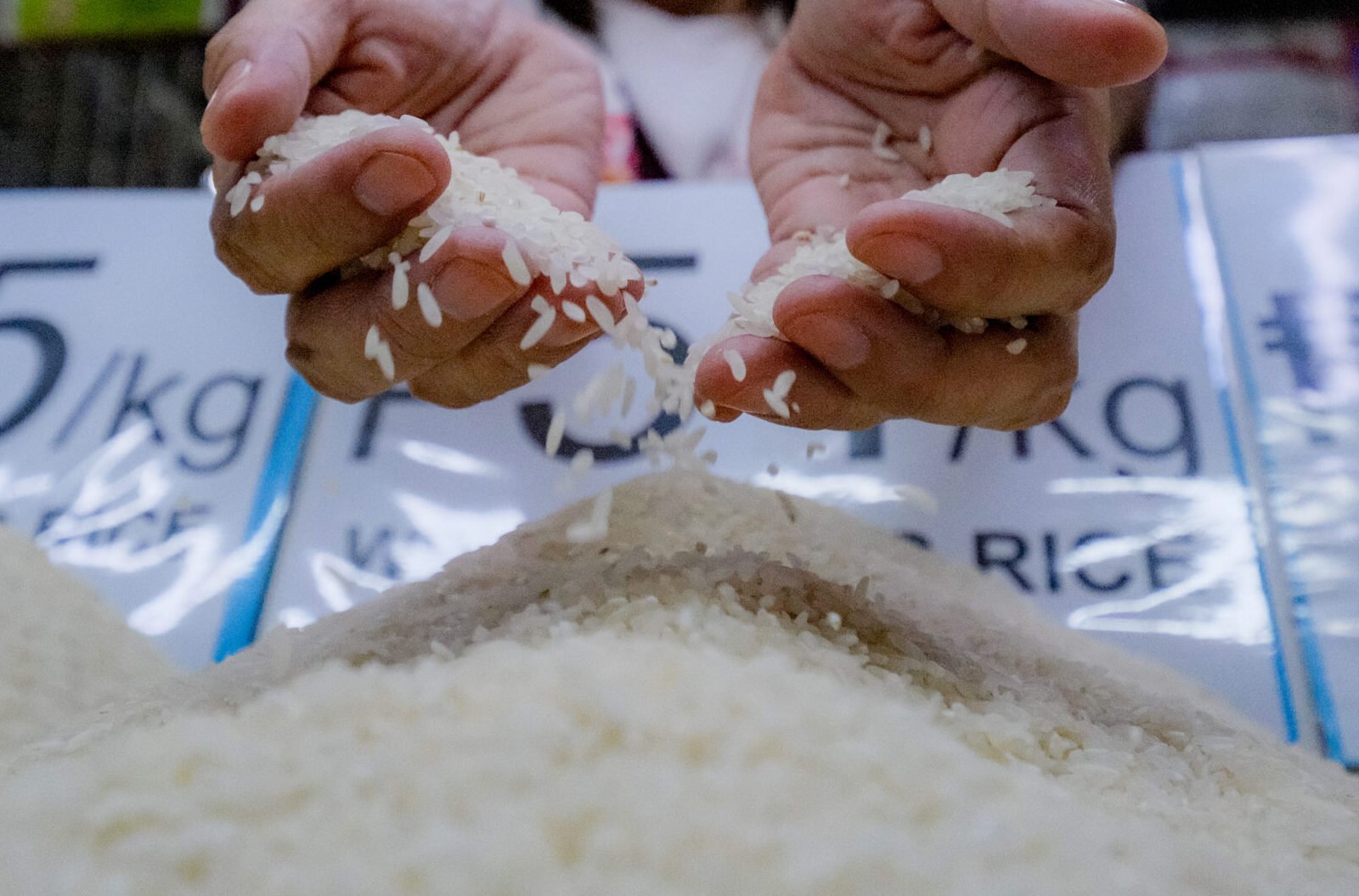 DA says rice prices to dip with price cap lifting, grain retailers urge action vs price fixers