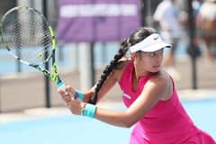Alex Eala gets the door in doubles play in the W110 Tokyo tournament in Japan. | PHOTOGRAPH COURTESY OF Alex Eala/FB