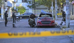 Blasts rock Quito, inmates take 57 guards hostage