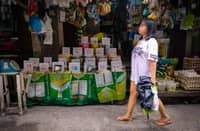Grains dealer in a busy Manila district sells rice all at prices beyond the P45 ceiling that Executive Order 39 mandated starting on Tuesday. | PHOTOGRAPH BY YUMMIE DINGDING FOR THE DAILY TRIBUNE @tribunephl_yumi