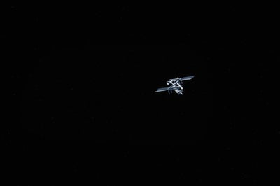 Two Russians, American reach space station