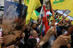 Lebanon’s Hezbollah and Israel trade cross-border fire