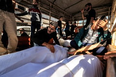 ‘This is a massacre’: Gaza takes stock after deadly hospital strike