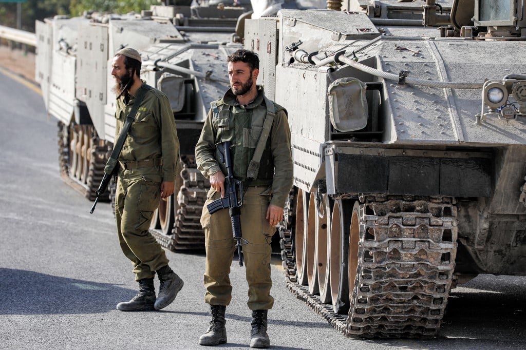On the edge of Gaza, Israeli soldiers brace for battle