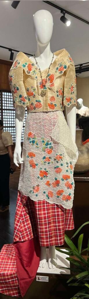 A baro't saya designed with 1920s-inspired fashion. The skirt is made of hand-woven Miag-ao patadyong from Iloilo.
