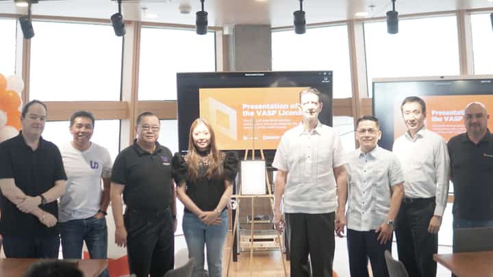 Unveiling the full Virtual Asset Service Provider license from the Bangko Sentral ng Pilipinas are (from left) UnionBank chief financial officer Manuel Lozano, UnionDigital Bank CEO and president Henry Aguda, UnionBank president and CEO Edwin Bautista, UnionBank emerging technology group head Catherine Anne Casas, UnionBank vice chairman Justo Ortiz, UnionBank chief technology and operations officer Dennis Omila, UnionBank treasurer and head of global markets Johnson Sia and UnionBank chief cross-sell officer Antonio Sebastian Corro. | Photograph courtesy of UnionBank