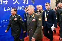 Top China, Russia officials rue stoking turmoil