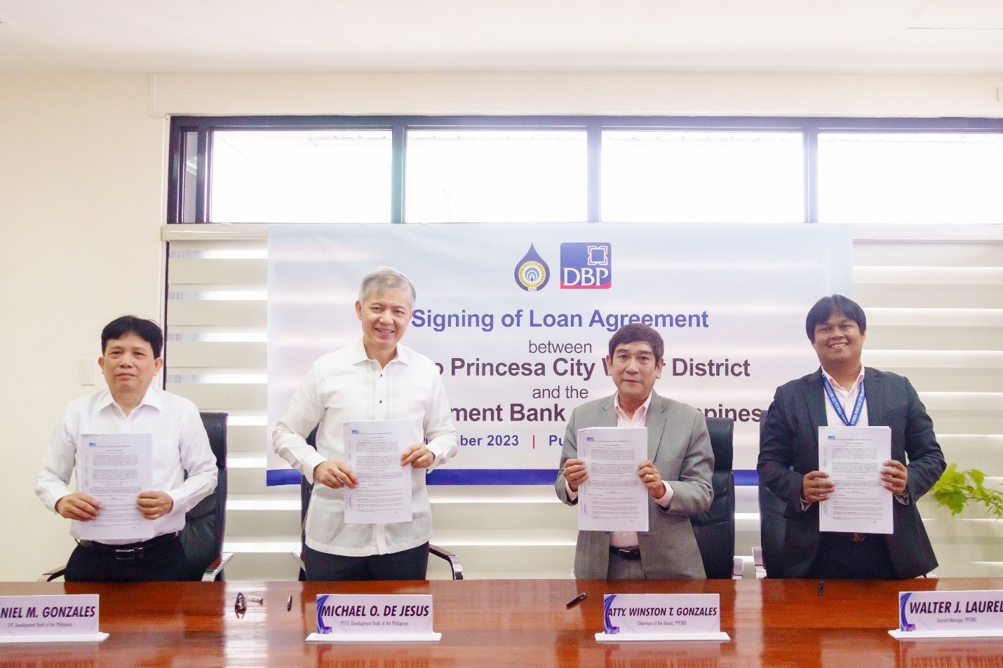 DBP president and CEO Michael O. de Jesus (second from left) during the loan agreement signing with the Puerto Princesa City Water District, along with DBP senior vice president Daniel Gonzales, PPCWD chairman Atty. Peter Winston Gonzales and PPCWD general manager Walter Laurel.(PHOTOGRAPH COURTESY OF DBP)