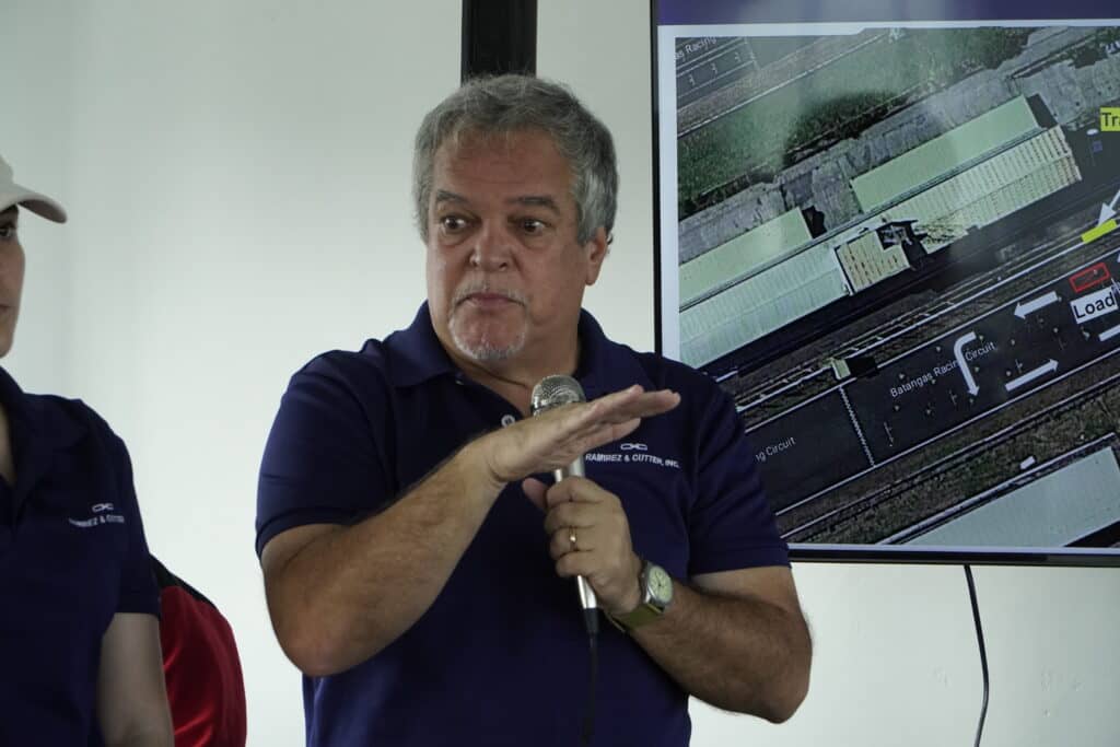 RENOWNED car racer Georges Ramirez explains to the participants how to best enjoy the Empow Sports Sedan.