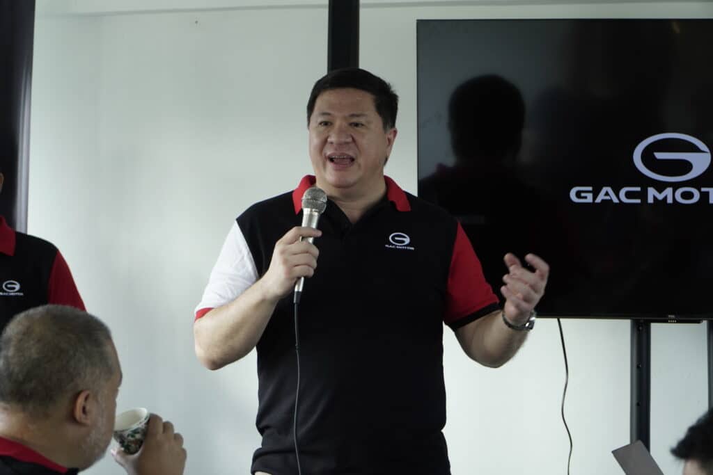FRANZ Decloedt, brand head of GAC Motors, ushers the participants who get to have the thrill of driving Empow on the track.