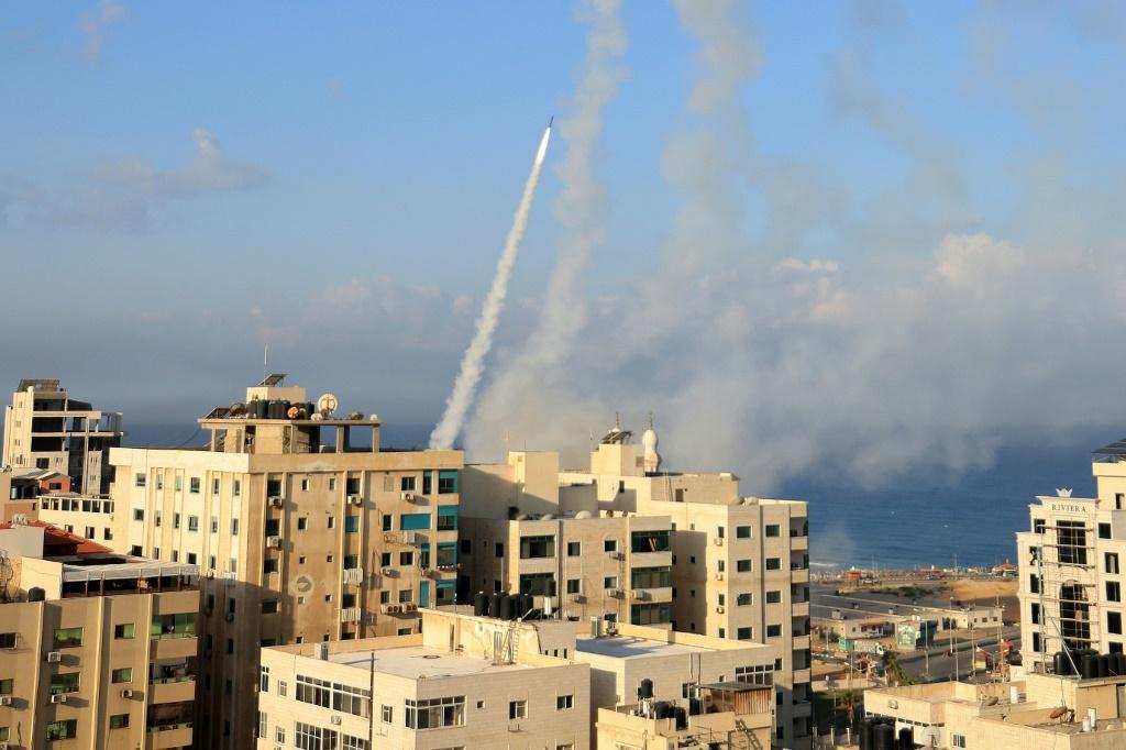 Israel says at ‘war’ after rocket barrages, militant infiltration