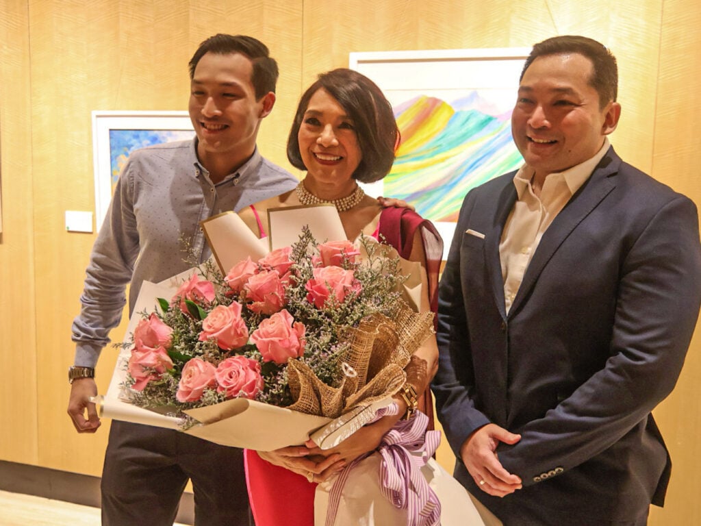 Mav Rufino flanked by Brandon Lim (left) and BR Rufino Lim