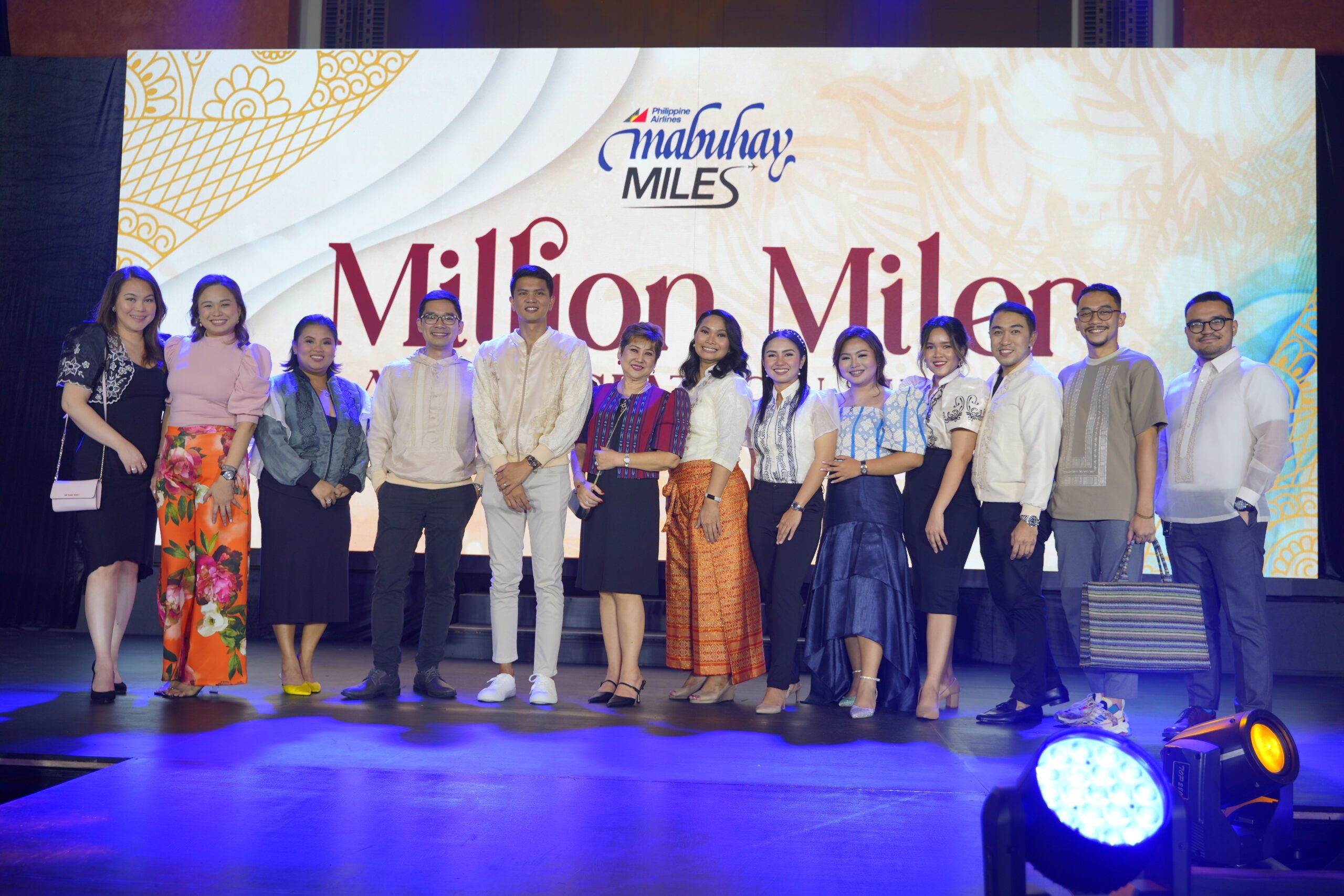 PAL AVP for Loyalty Marketing Gino Domingo (fifth from left) and his Mabuhay Miles team, with PAL Marketing AVP Howie Uyking and Marketing consultant Ernest Acar (second from right).