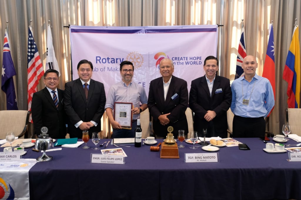 Luis Felipe Lopez, head of product development of Base Bahay Foundation Inc. (third from left), stands with the Plaque of Appreciation given to him for gracing the joint Rotary Club of Makati and Rotary Club of Makati-West meeting as guest speaker last Tuesday, 26 September 2023 at the Peninsula Manila. With Lopez are (from left) RC Makati member Chris Ferareza, RC Makati West president, RC Makati president Bing Matoto, RC Makati director Rodrigo Segura, and RC Makati West director Charles Rufino.