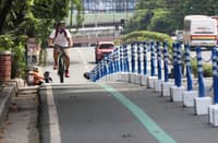 A RIDER is seen passing through a bike lane in Metro Manila