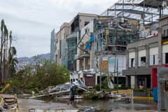ACAPULCO, MEXICO - OCTOBER 25: General view of a shopping mall destroyed after hurricane Otis hit Acapulco on October 25, 2023 in Acapulco, Mexico. Otis made landfall through the coast of Acapulco around midnight of October 25 as a category 5 storm. President Lopez Obrador reported that communications were interrupted in the city, power lines were down affecting almost a million people, infrastructure is severely damaged and the roads to the port present important damages. Hurricane Otis degraded to category 2 after reaching land. (Photo by Oscar Guerrero Ramirez/Getty Images)