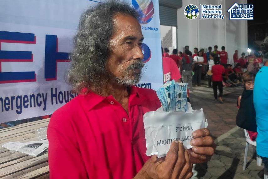 Aklanons get typhoon cash aid