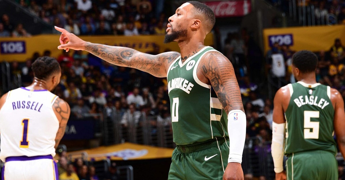 NEW BEGINNING — Lillard makes rousing Milwaukee debut