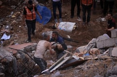Gaza camp blast kills dozens as Israel strikes top Hamas militant