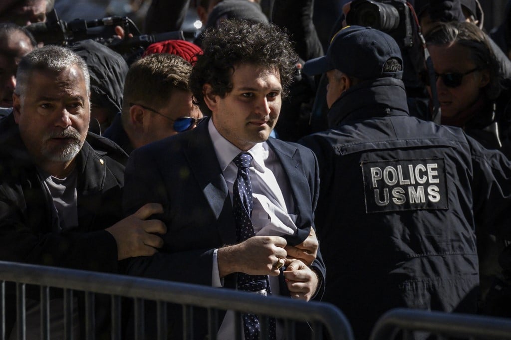 Former crypto tycoon Sam Bankman-Fried found guilty on all counts at fraud trial