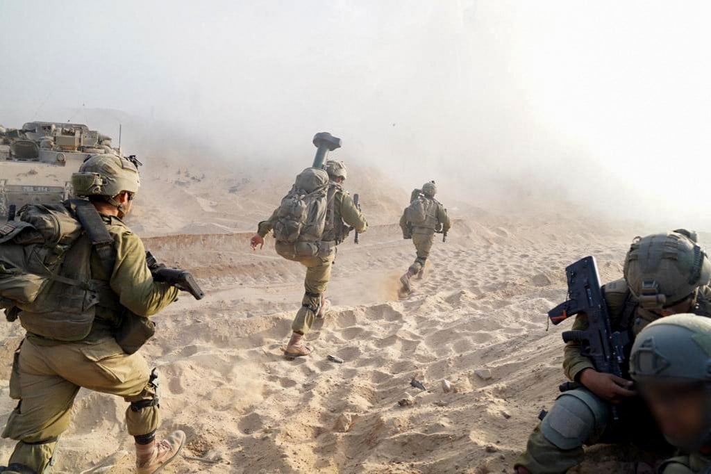 One month on, Israel threatens to intensify war on Hamas