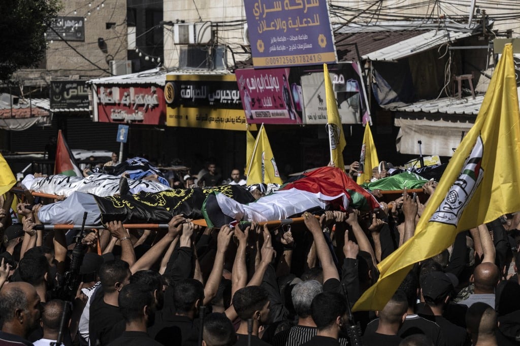 West Bank militants, supporters hold mass funeral