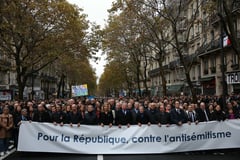 Thousands march in Paris against anti-Semitism