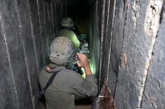 Israel army shows reporters tunnel in Gaza hospital