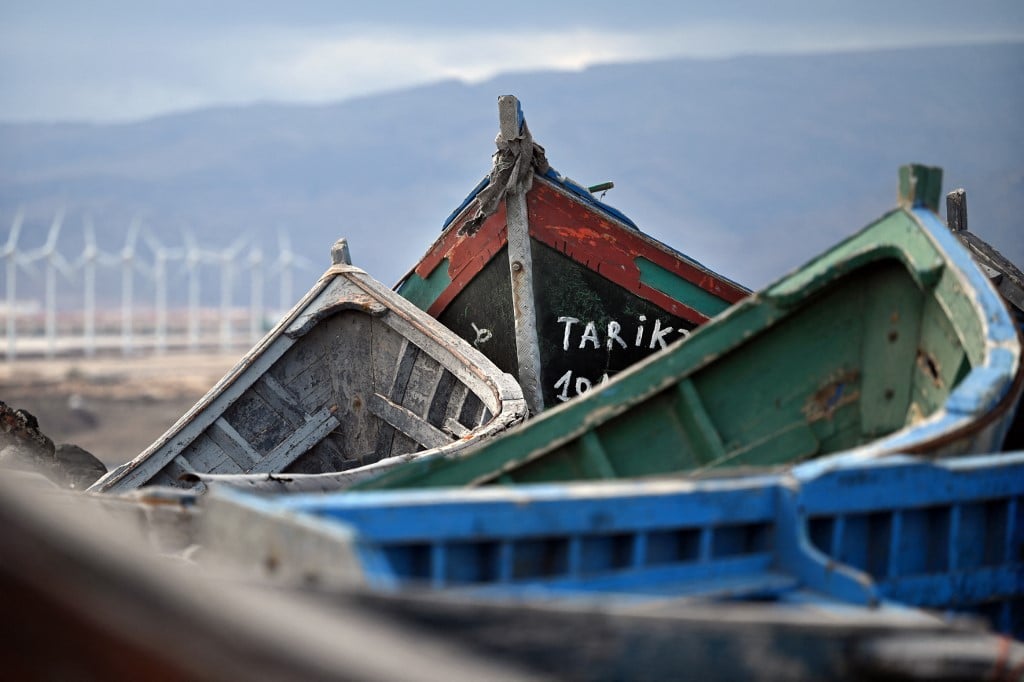 Vessels accumulate at a 'boat cemetery' in Arinaga on the Spanish Canary island of Gran Canaria on November 18, 2021. Photo by LLUIS GENE / AFP
