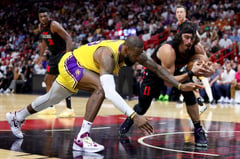 Calf injury sidelines Lakers’ James