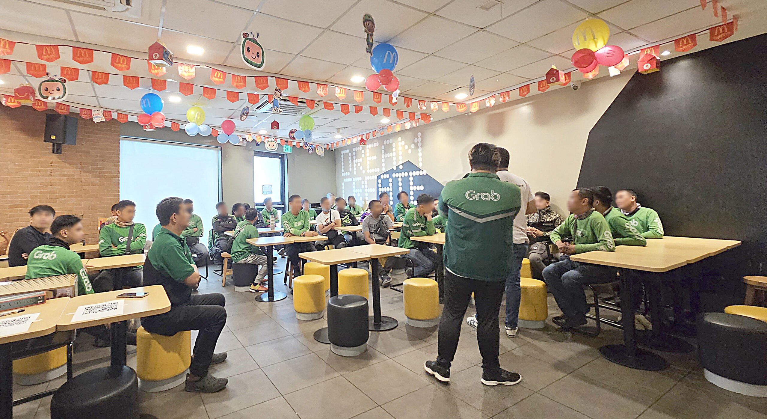 Grab rider-partners respond positively to new earnings model