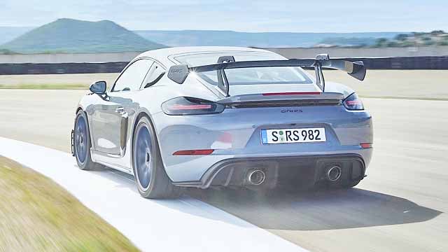 A NEW fixed rear wing with a swan-neck attachment, derived from the Porsche 911 RSR GT race car, adorns the Porsche 718 Cayman GT4 RS.