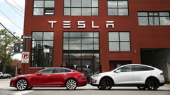 Tesla suit forces striking postal workers to deliver car plates