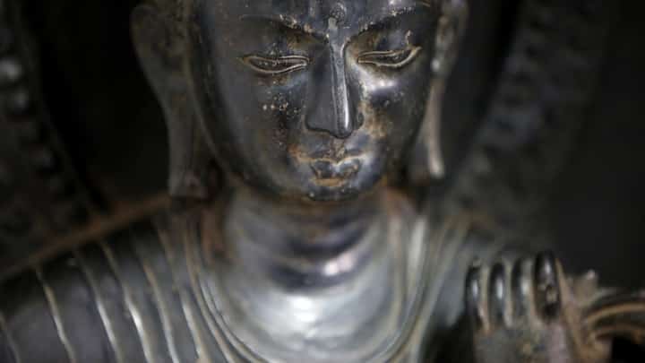 FILE PHOTO: A 700-year-old standing statue of the Buddha that was returned to Nepal from New York's Metropolitan Museum of Art is pictured in its delivery crate at the Department of Archaeology in Kathmandu on 4 April 2018. (Photo by Gopen RAI / AFP)